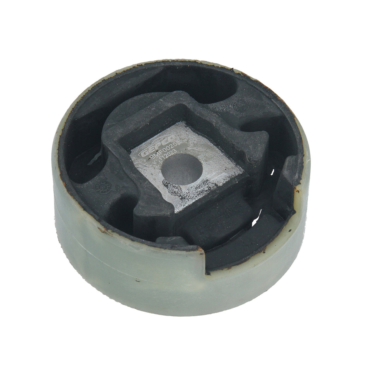 Detailed close-up of the rubber and metal components of the rear engine mount set, highlighting the bushing and rubber material.